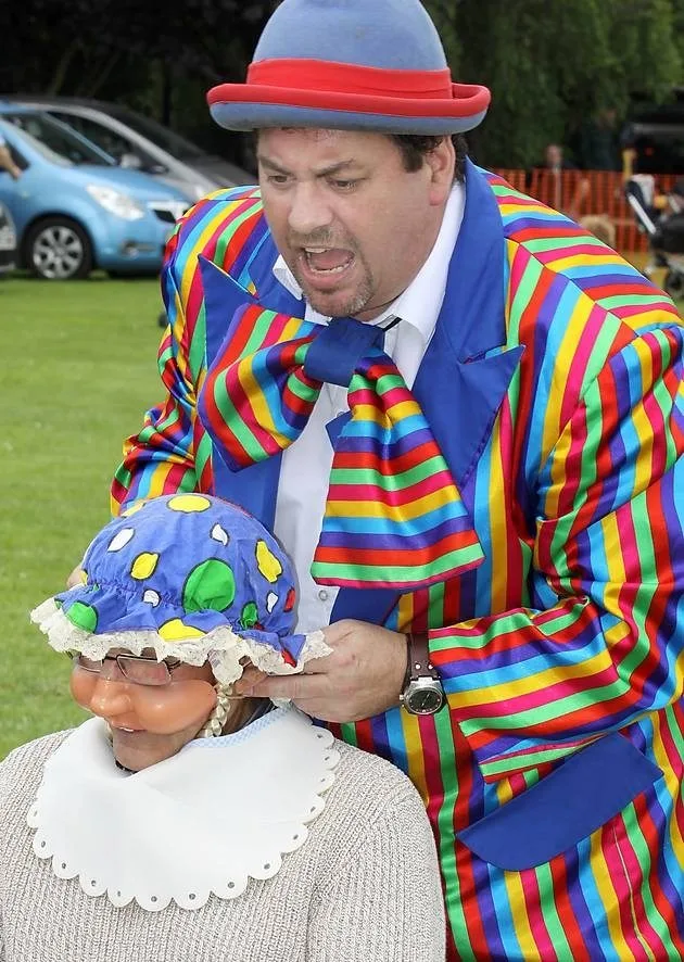 Children laughing during Stripey Wipey community party entertainment